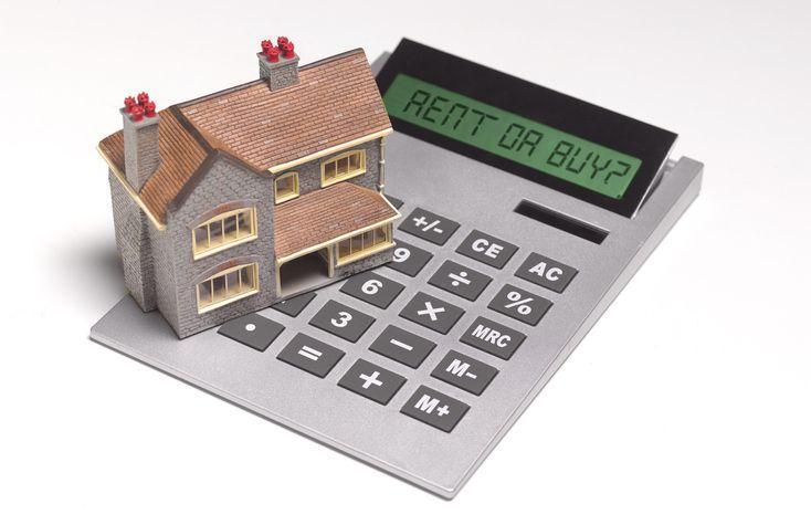 Domek stojący na kalkulatorze